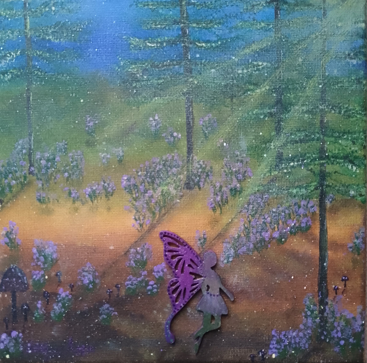 An original canvas whimsical painting, featuring a forest scene where bluebells grow with trees, a purple fairy walks along the pathway. In colours of blue, greens, browns, purple and lilac. Original acrylic canvas painting by Cathy's Art