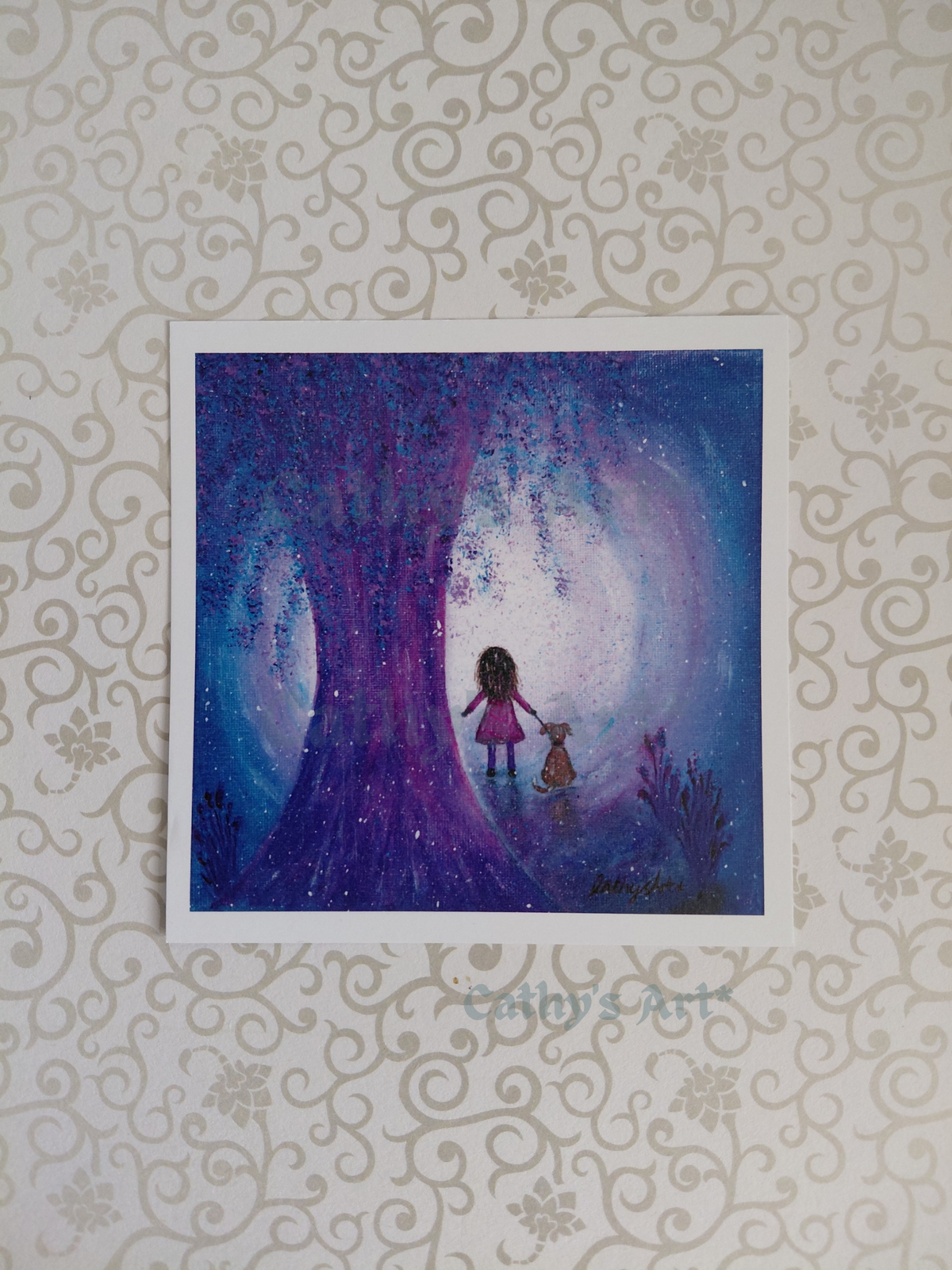 A square art print featuring a whimsical painting of a girl standing on a path under a large glowing purple tree next to a small dog. Artwork by Cathy's Art*