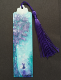 A hand painted whimsical bookmark with a purple tassel, featuring an artistic painting of a moonlit tree, in shades of turquoise, purple, and white, with a small rabbit illustration near the bottom. Signed "Cathy's Art*" at the bottom. Original hand painted bookmark by Cathy's Art*