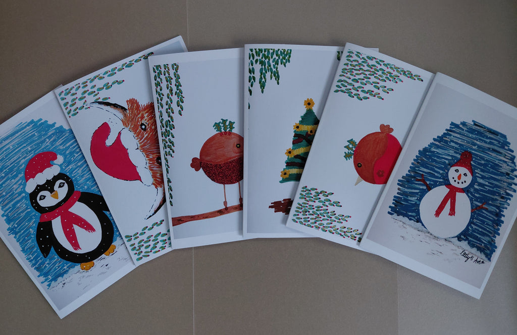 Printed artwork Christmas Cards by Cathy's Art. Cute festive wildlife, penguin, highland cow, robins, sunflower Christmas tree and snowman.