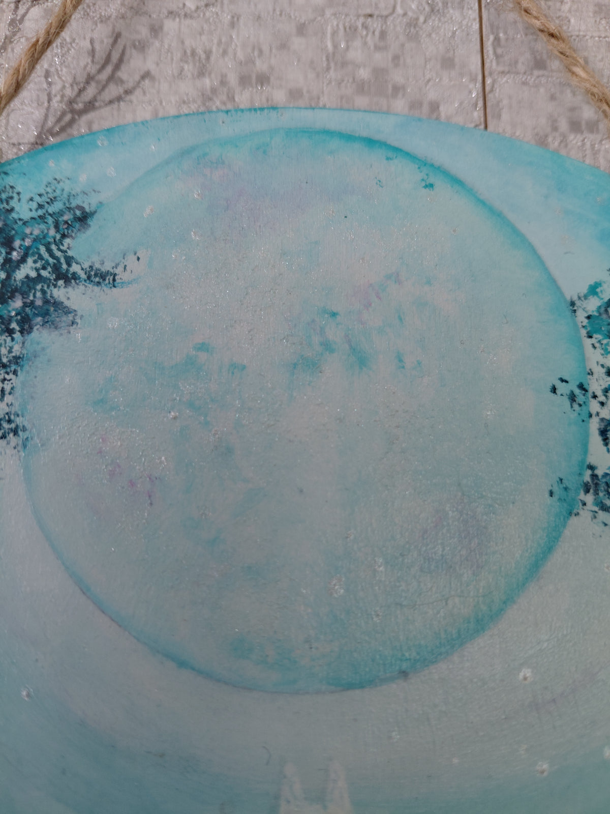 A close up painting of a full moon whimsical forest scene, dark tree foliage is at either side of the moon and the ears of a white cat feature at the bottom. Metallic pearl white dots shine. Original acrylic painting by Cathy's Art*