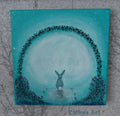 A square canvas painting featuring a whimsical magical scene in pale green, turquoise and mauve colours, a grey hare sitting looking into the wonderland that lies beyond the archway. Flowers grow either side of the arch and around it. Tiny mushrooms line the pathway. On a grey patterned wall. Original acrylic canvas painting by Cathy's Art*