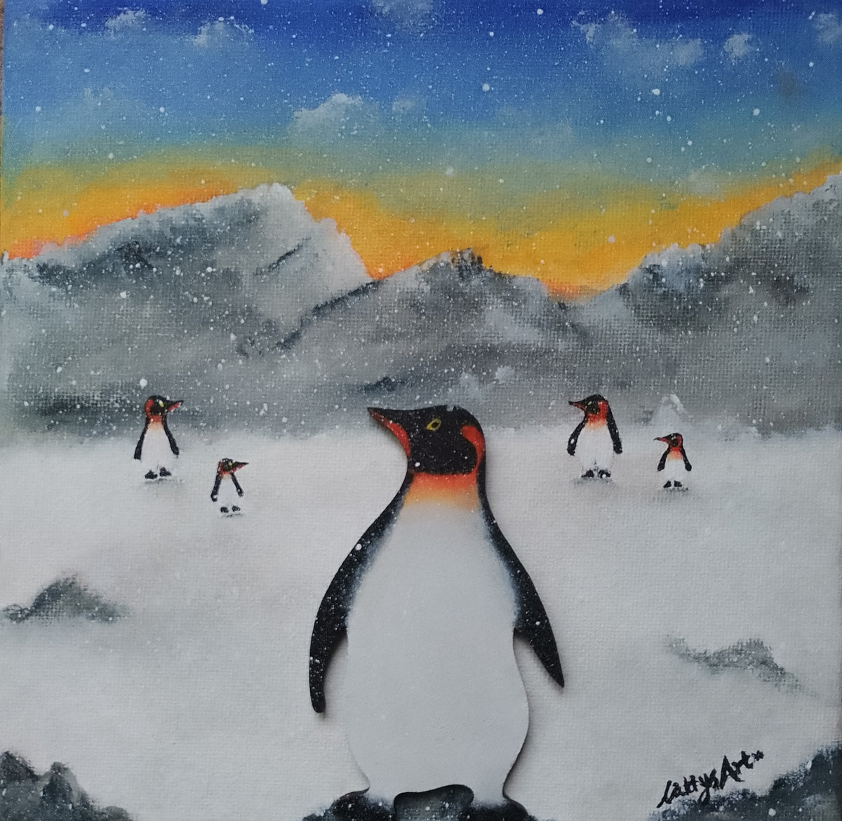 A painted winter scene showing penguins in a snowy landscape with mountains and a blue-to-yellow sunset sky. One large penguin to the front and four small penguins in the backdrop of the painting. Original acrylic canvas painting by Cathy's Art*