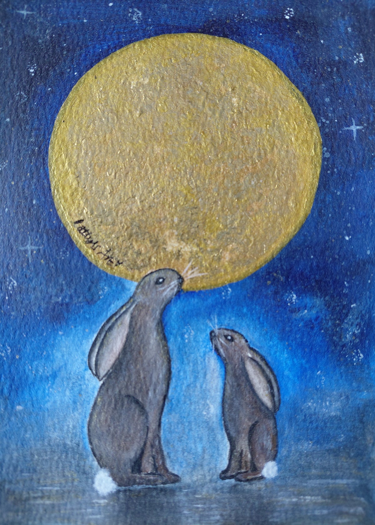 A whimsical painting of two grey brown hares under a large glowing yellow moon against a deep blue starry night sky. Original acrylic painting by cathy's Art*
